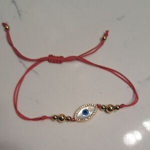 Evil Eye Orange String Bracelet with Gold Accents